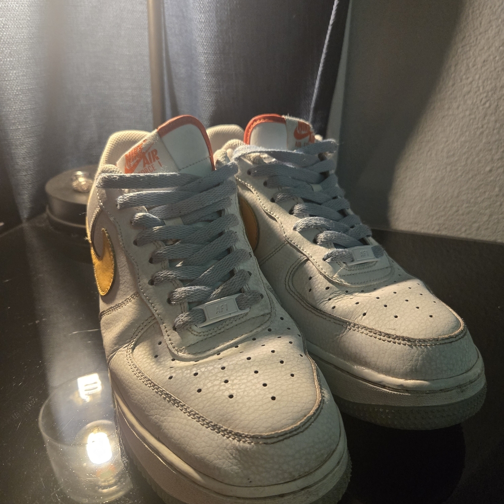 Nike Air Force 1 White and Gold Sneakers